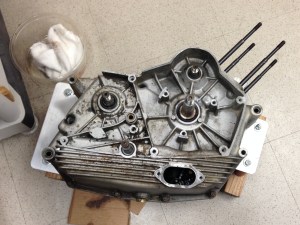 Side view of the engine case with crankshaft and camshaft belts and gears removed and oil filter removed